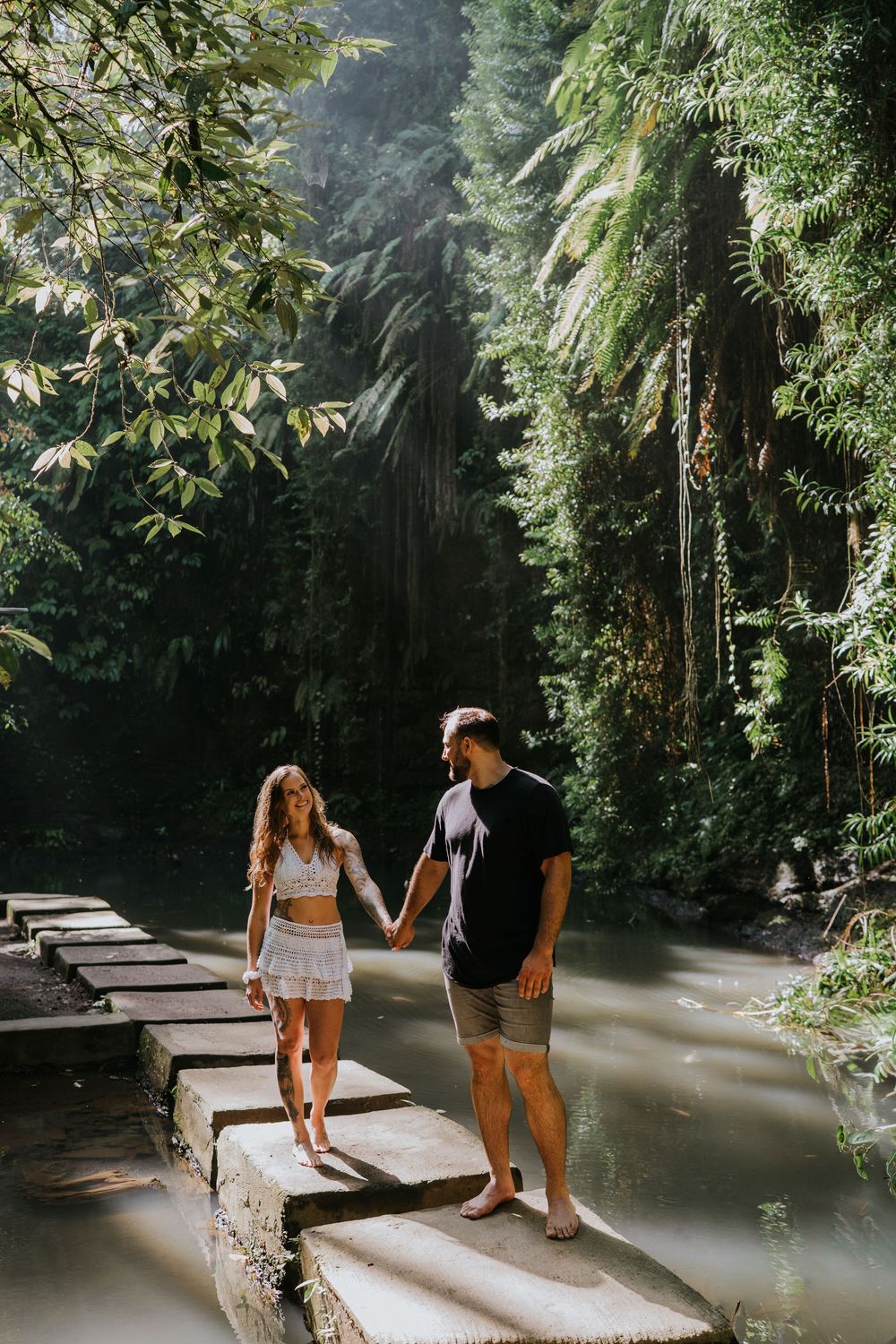 Bali couple photography services at Ulu Petanu Waterfall in Ubud.