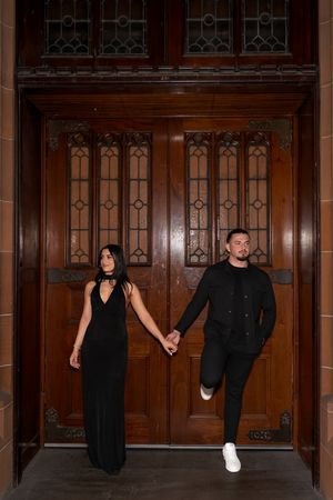 A series of candid shots showing a couple posing playfully by wooden church doors.