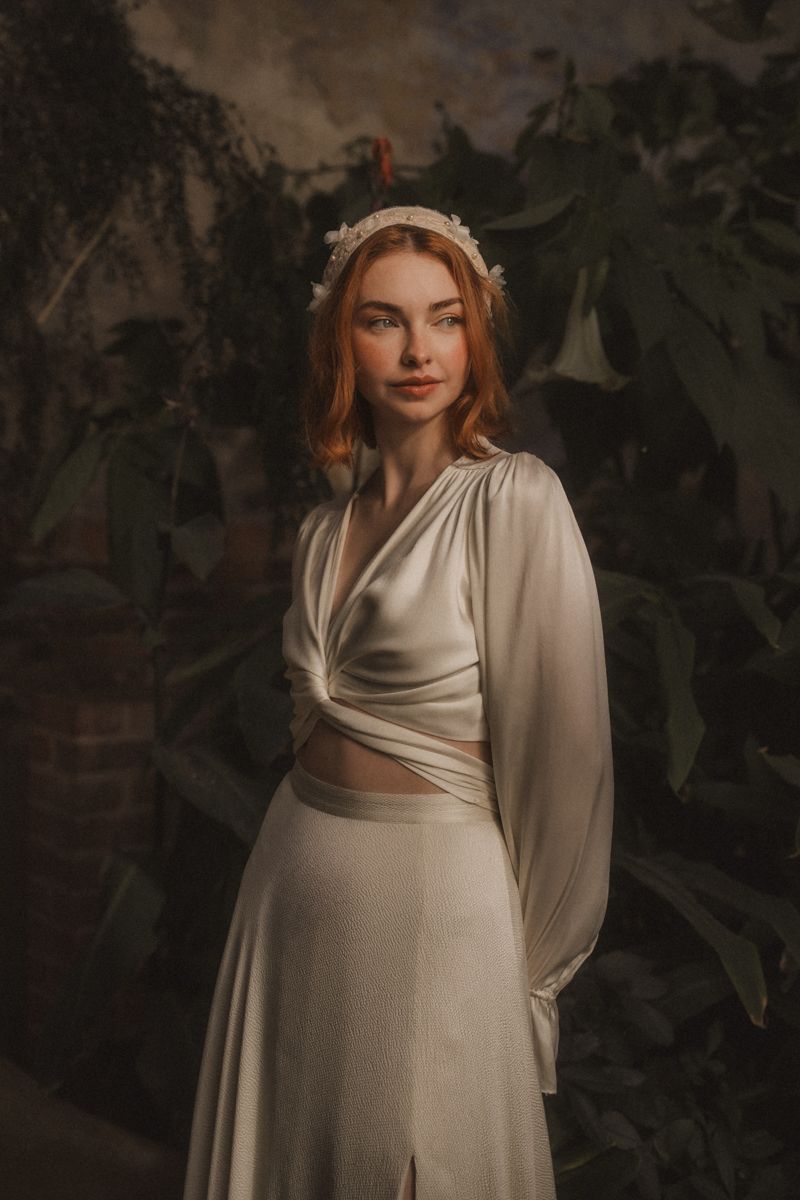 A dreamy close-up portrait series in warm sepia tones showing delicate details of lace and soft lighting.