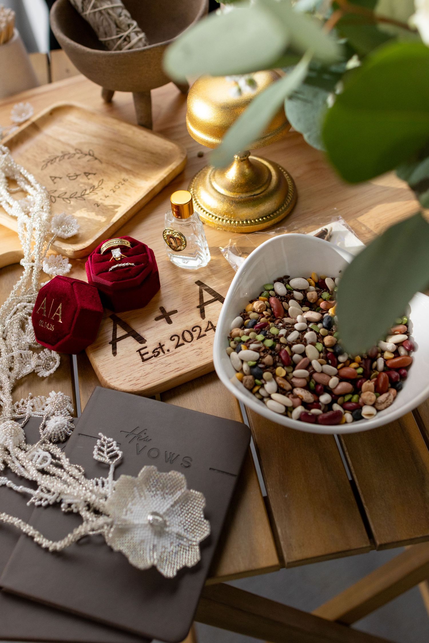 Joyful bridal preparations with red accents and natural lighting.
