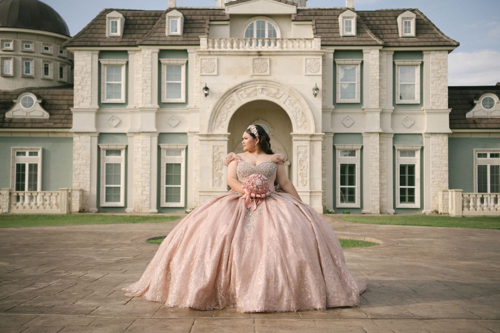 A pink ballgown dress photographed in sequence against a grand estate building exterior.
