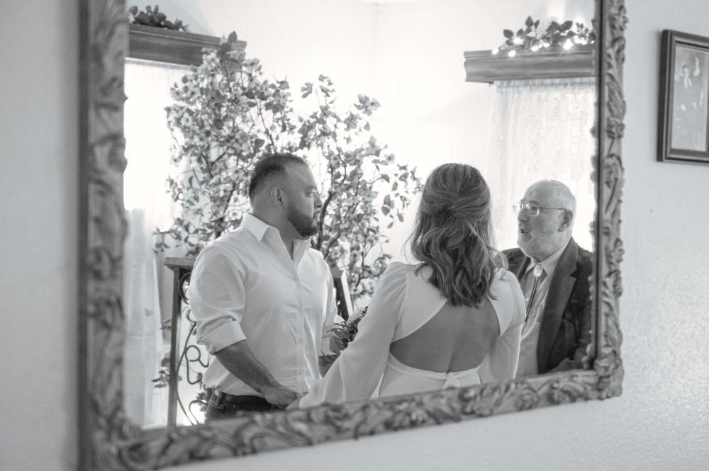 Elopement ceremony at the hitching post in CDA Idaho. Taken by Jessica Rae Photography.