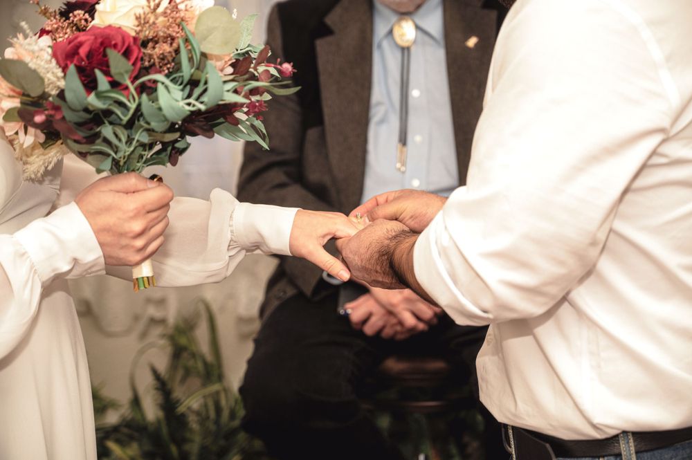 Elopement ceremony at the hitching post in CDA Idaho. Taken by Jessica Rae Photography.
