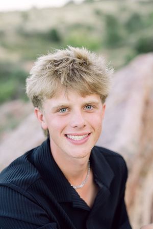 A series of headshots showing a person with blonde hair wearing a black sweater against a blurred background.