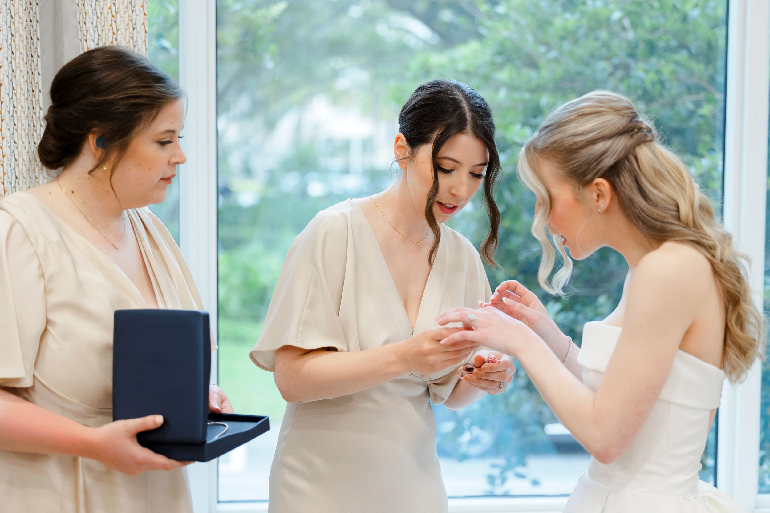 Bride getting ready at BallenIsles Country Club in Palm Beach during a wedding photographed by Ohio photographer Tom Forrest.