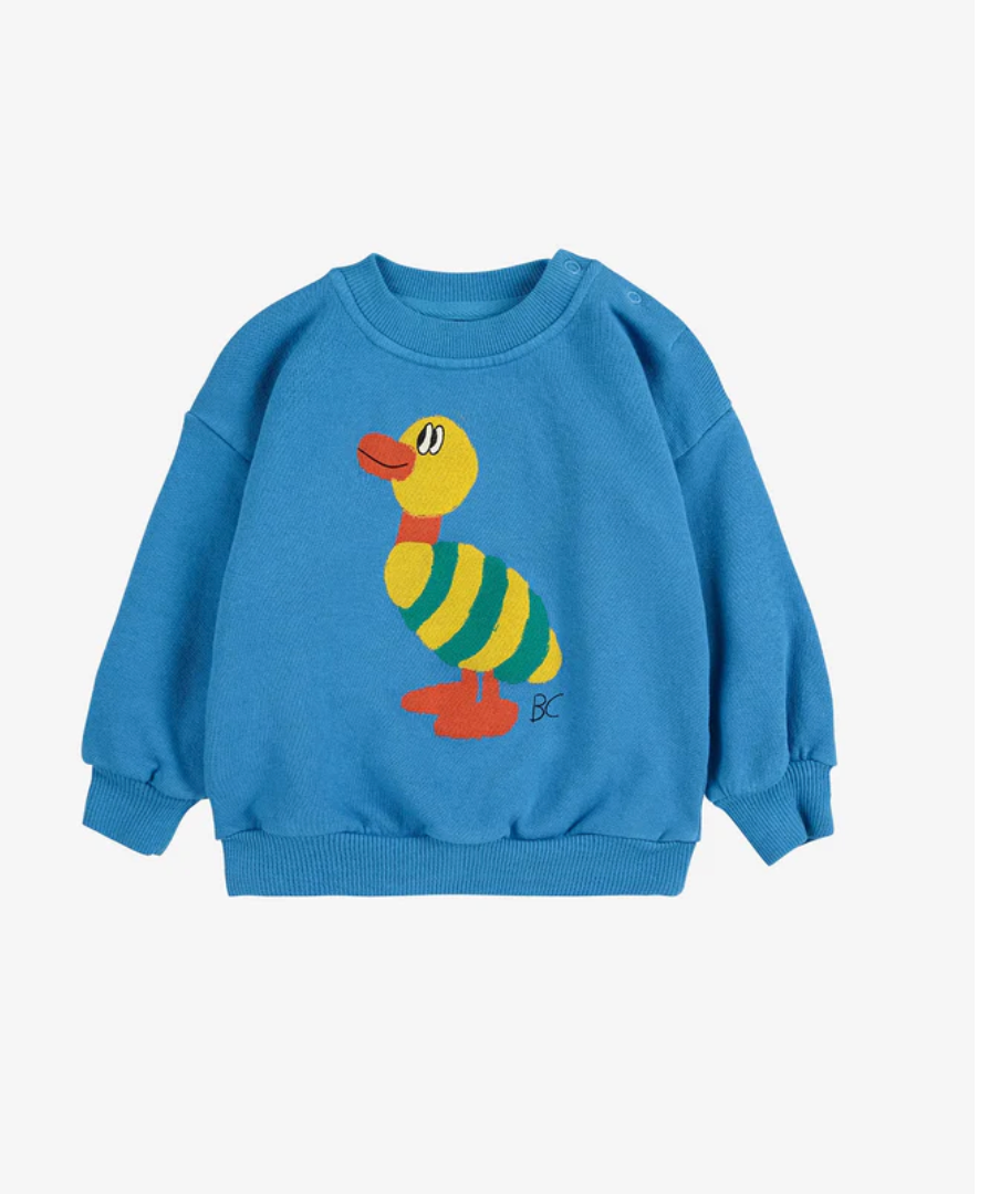 Blue children's sweatshirt featuring a cute yellow and orange duck design on the front.