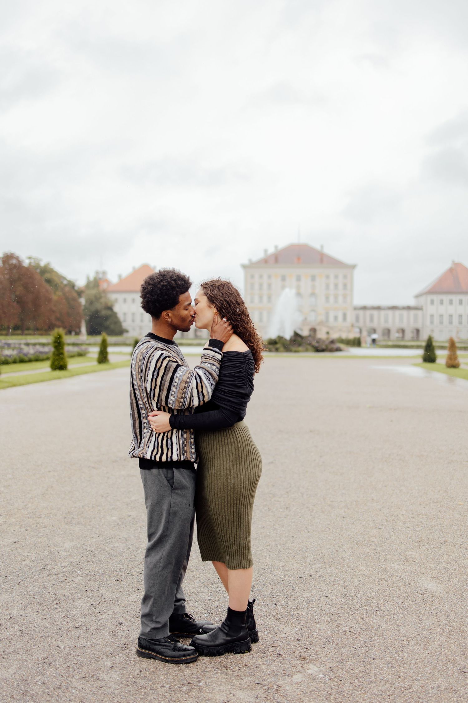 Newly engaged couple smiling at Nymphenburg palace, Munich Elopement Photographer, Munich Proposal Photographer, Engagement Photography