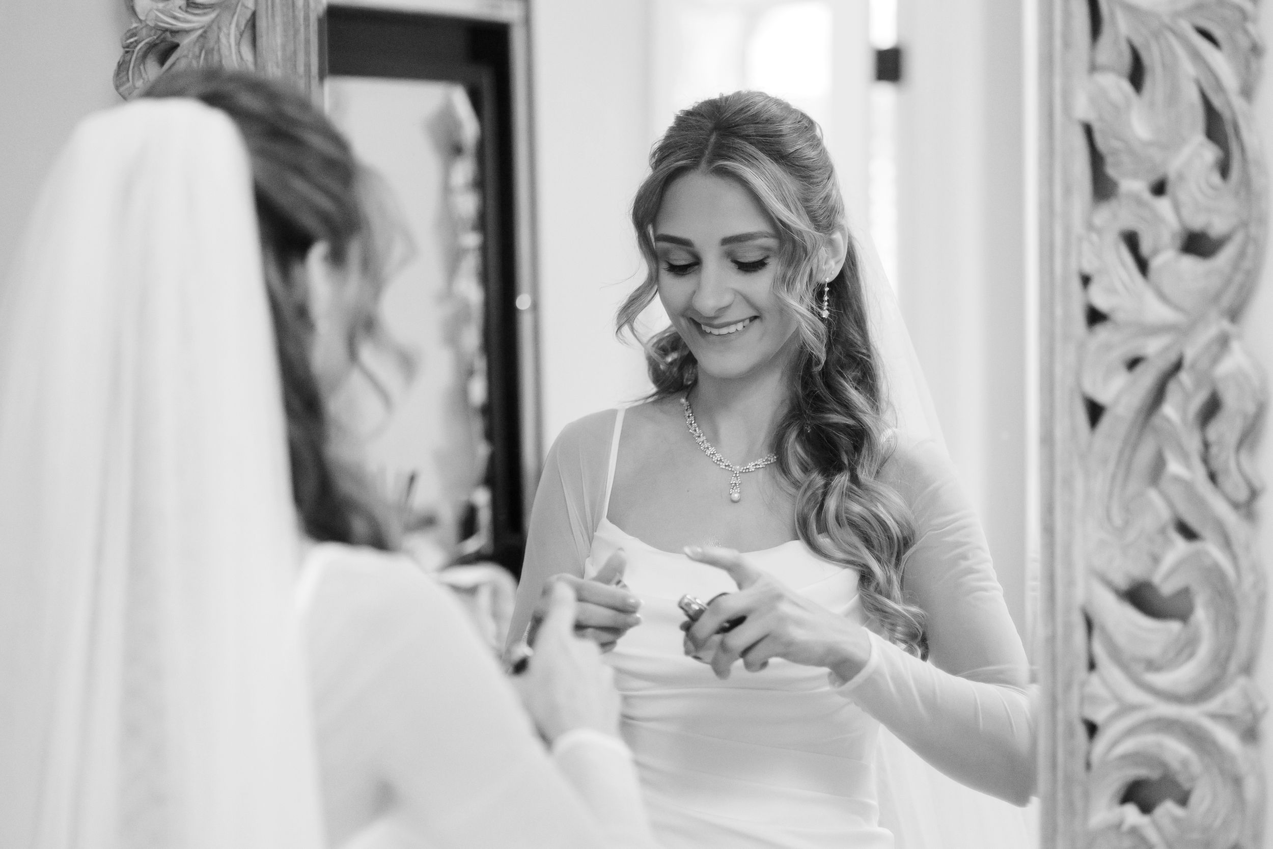 Bride getting ready for her wedding day in Northeast Ohio captured by Tom Forrest Photography.