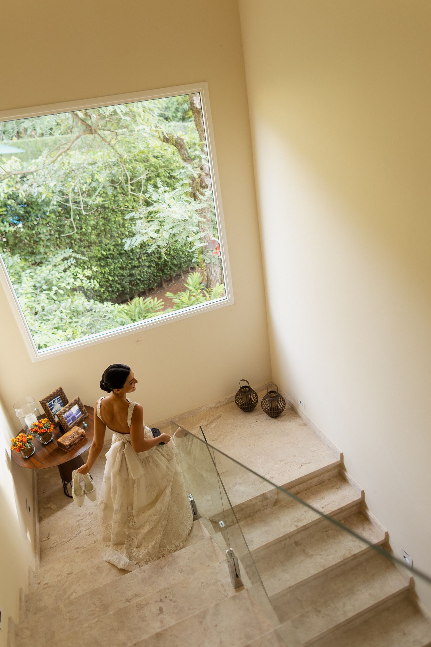 Time-lapse sequence shows step-by-step window installation process in bright interior room.
