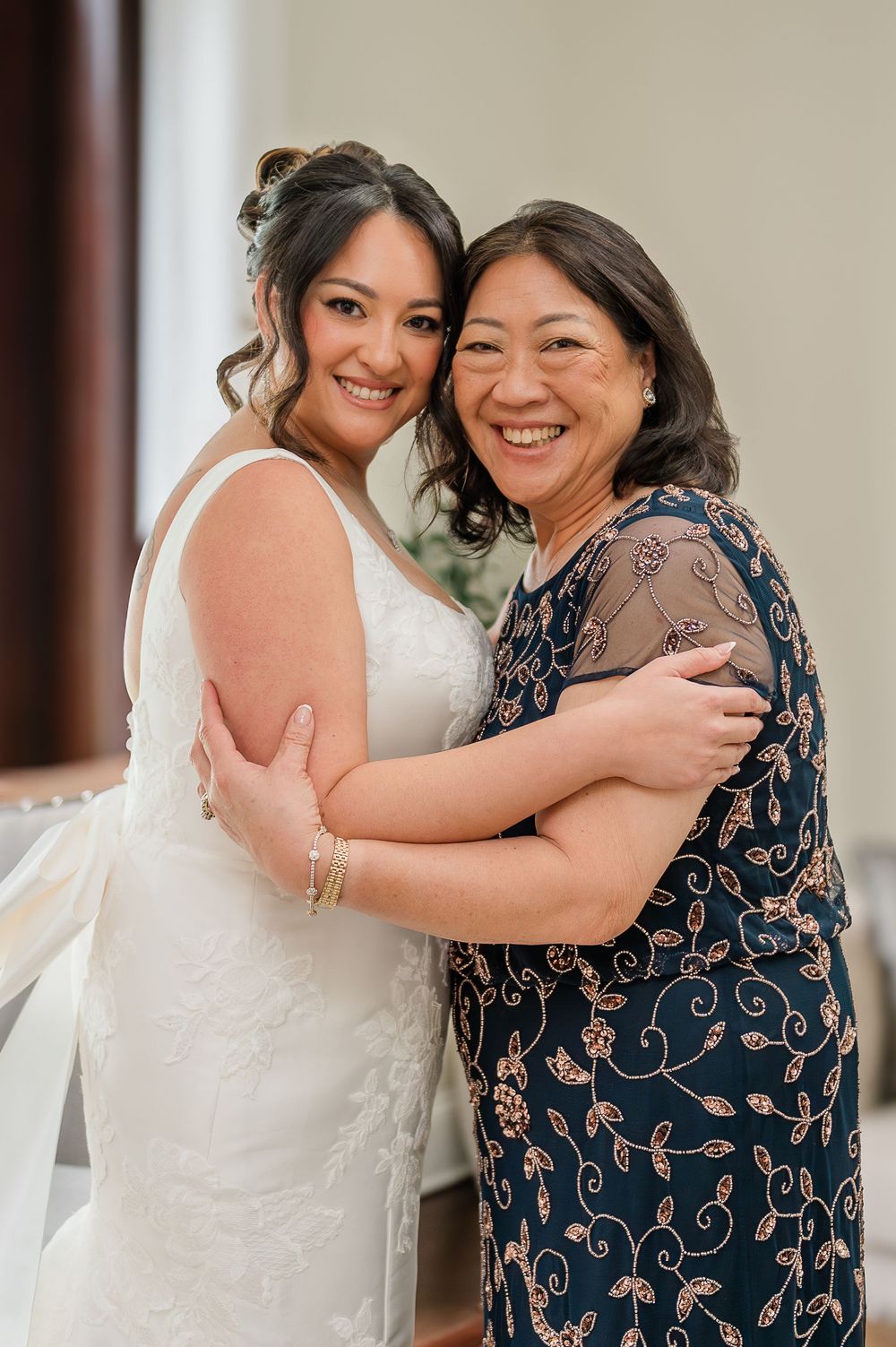 A tender moment captured in a series of photos showing an emotional embrace between two people in formal attire.