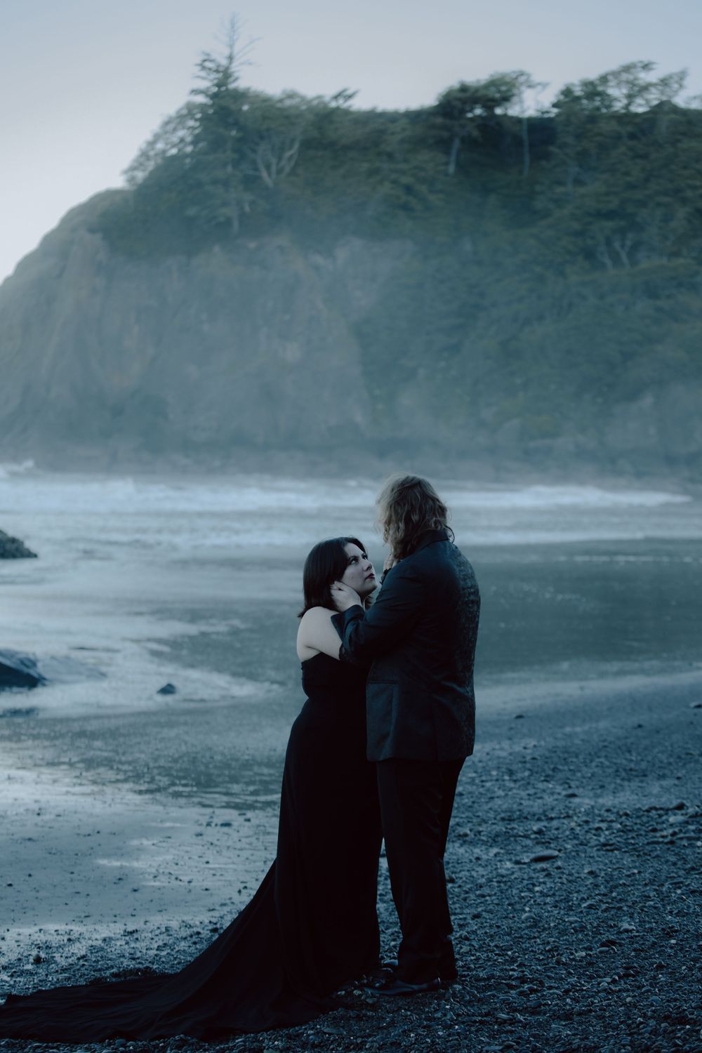 A dreamy seaside photo sequence showing two people sitting close together on a foggy beach.