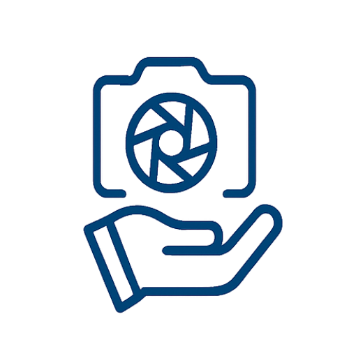 Blue line icon of a hand holding a camera representing professional photography services.