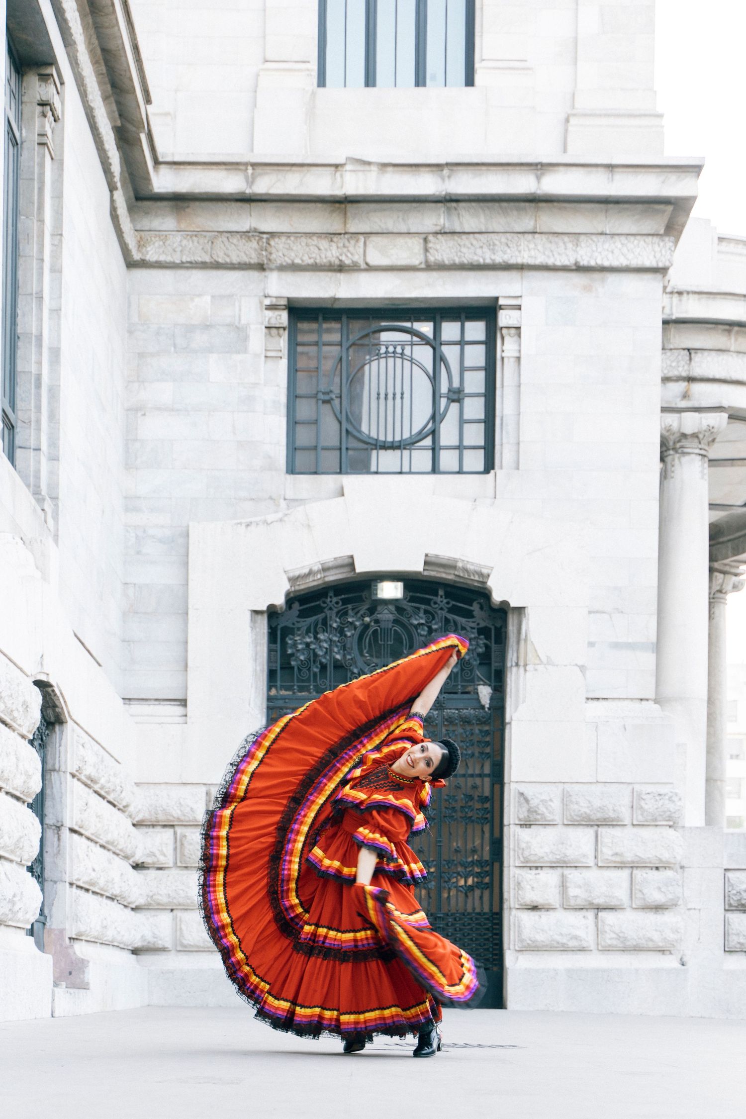 Professional Ballet Folklórico photography highlighting cultural dance outside Palacio de Bellas Artes in Mexico City