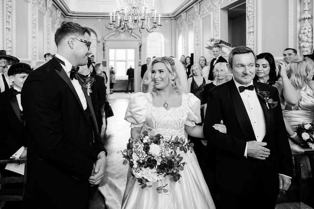 A black and white collage of wedding reception moments showing dancing couples and guests celebrating in an elegant ballroom.