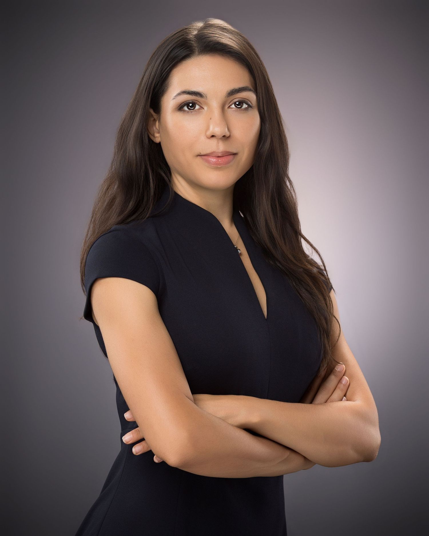 Studio professional headshot with soft lighting and a modern, polished appearance.