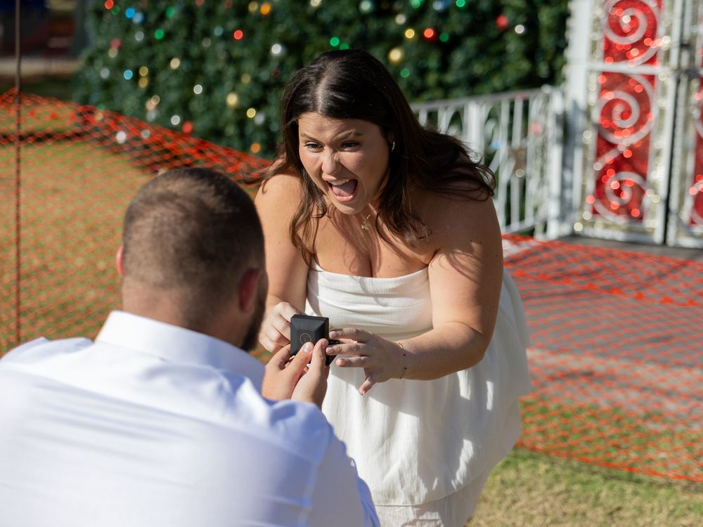 Outdoor engagement photoshoot sequence with decorative lights in background.