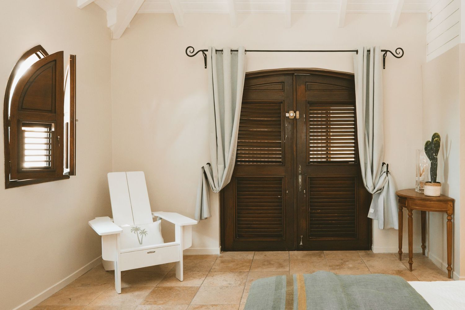 A multi-panel view of a bright and modern minimalist bedroom interior with white curtains and wooden shutters.