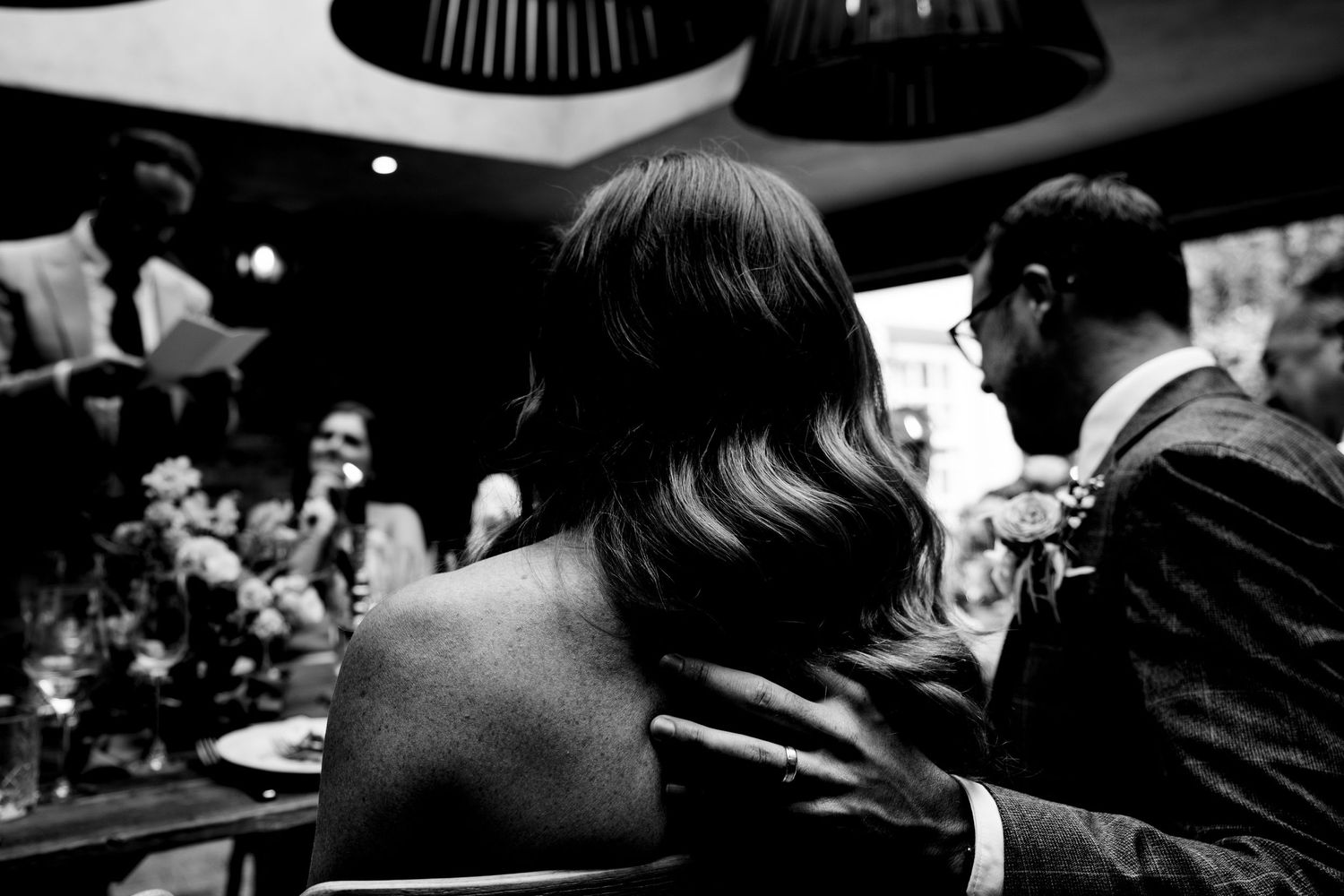 Elegant black and white photograph of wedding guests in classic vintage Wilson Coastal Club wedding reception.