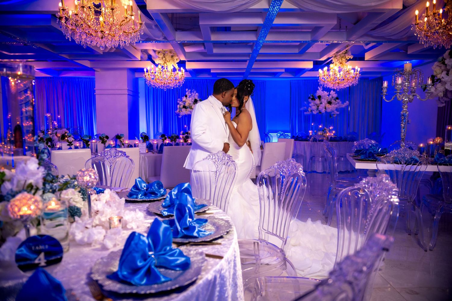 The bride and groom share a moment at their Destination wedding at Crystal Ballroom Ocean Walk captured by Destination Wedding Photographers