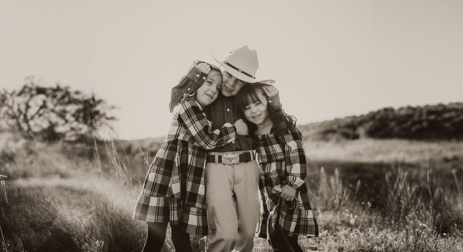 Wichita Wildlife Mountains Refuge Paul Family Photoshoot Session, siblings, mother father, fields, mountain, beautiful skies