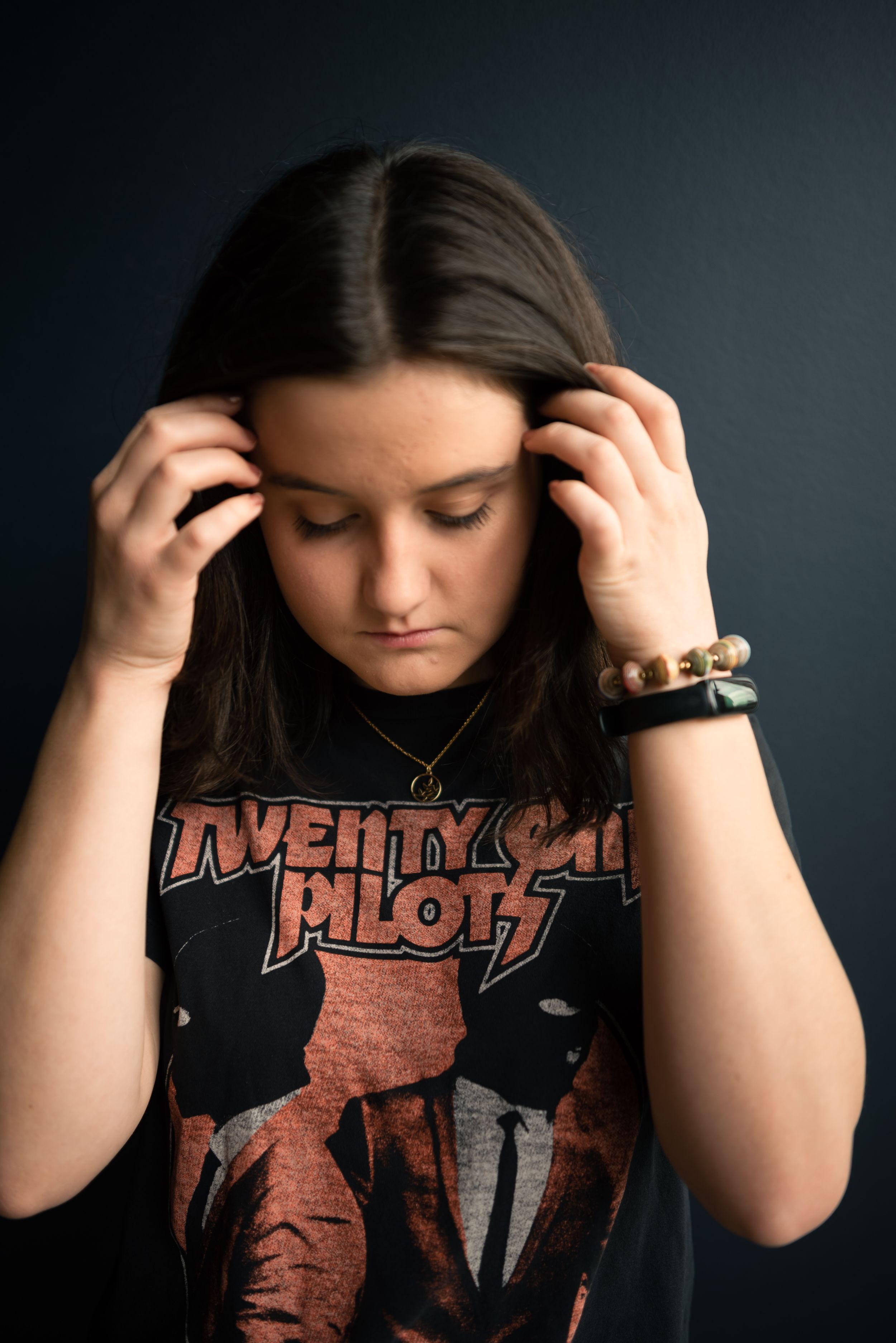 Memphis Family Portrait of homeschool senior at Crosstown Concourse during golden hour.