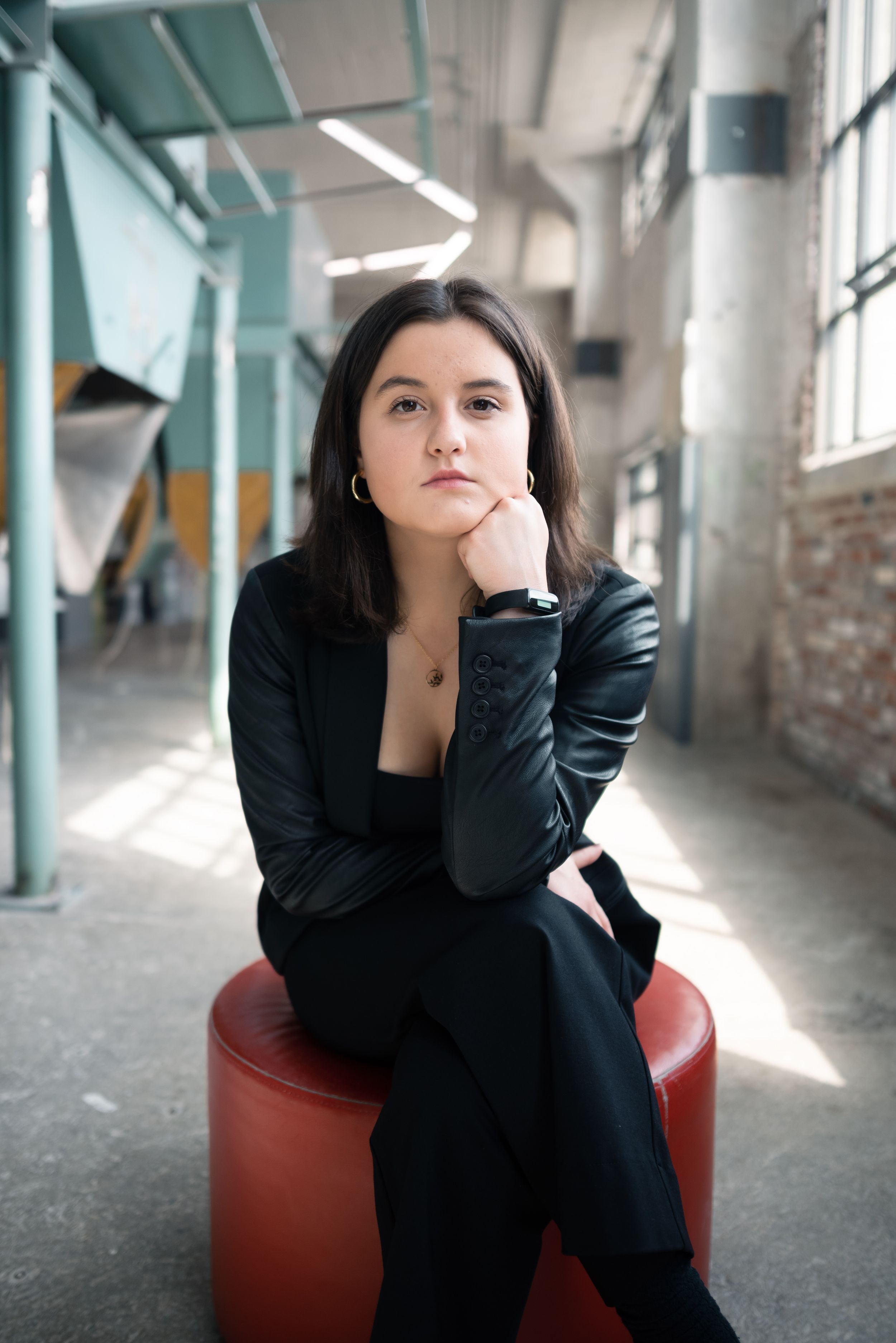 Memphis Family Portrait of homeschool senior at Crosstown Concourse during golden hour.