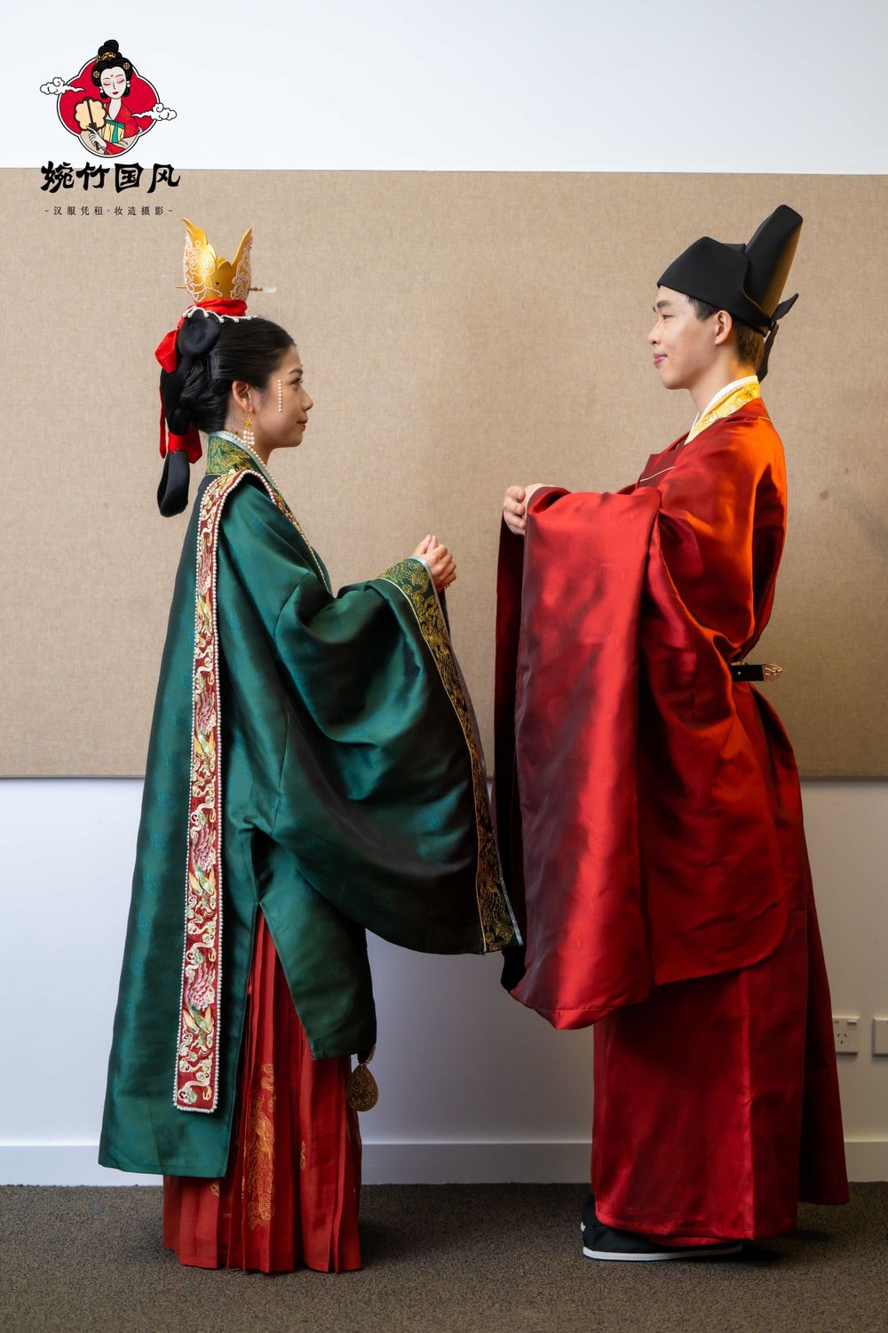 Dramatic stage photography of a traditional Hanfu fashion show featuring elegant performers, by an Auckland event photographer.