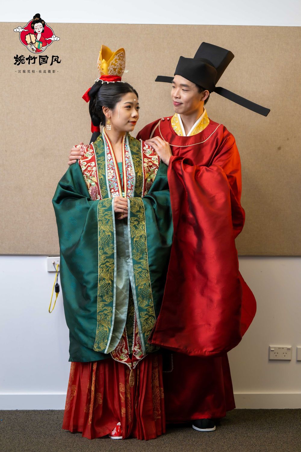 Dramatic stage photography of a traditional Hanfu fashion show featuring elegant performers, by an Auckland event photographer.