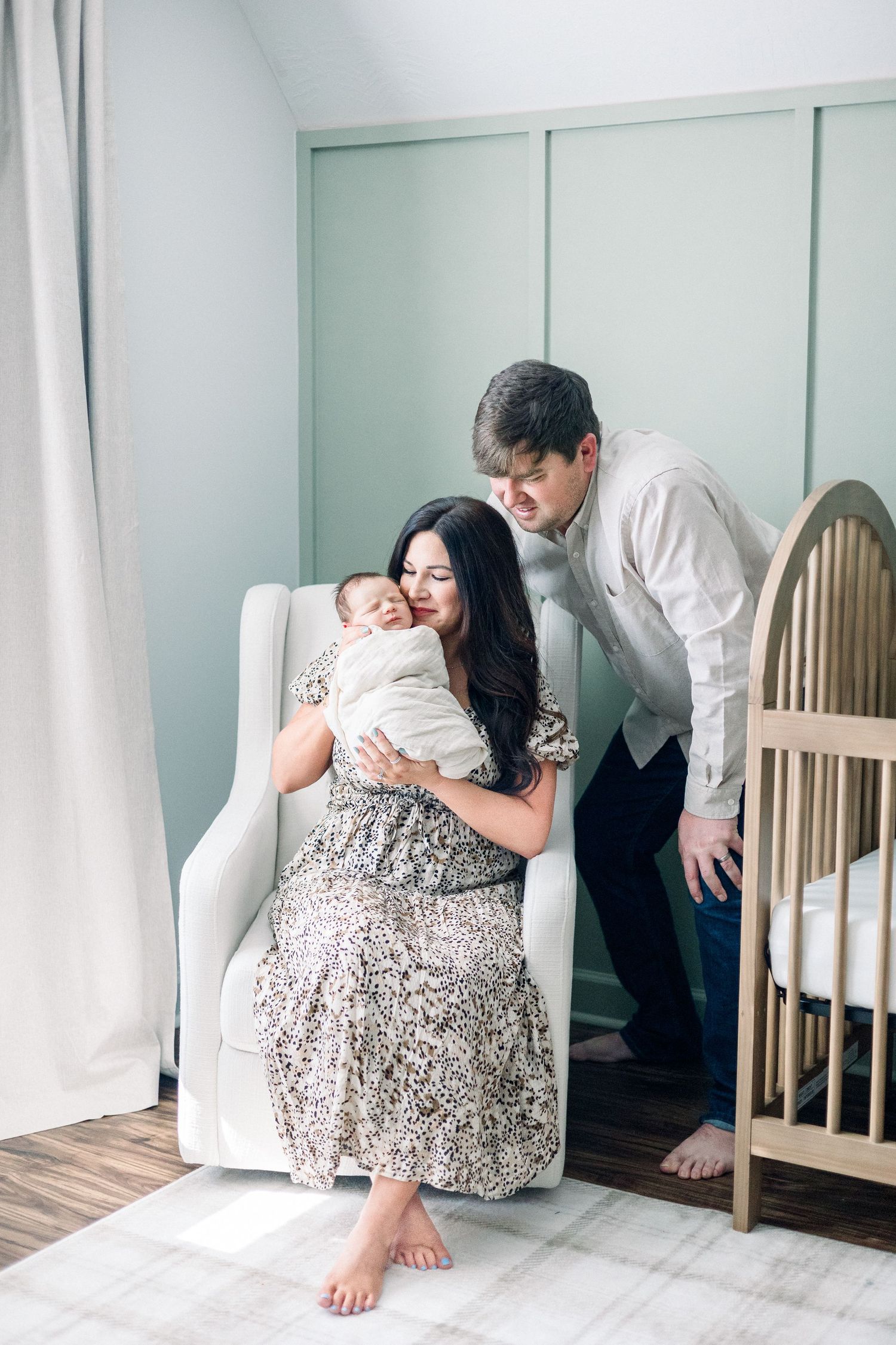 Newborn photographer in Augusta GA captures peaceful baby-led moment in cozy home setting