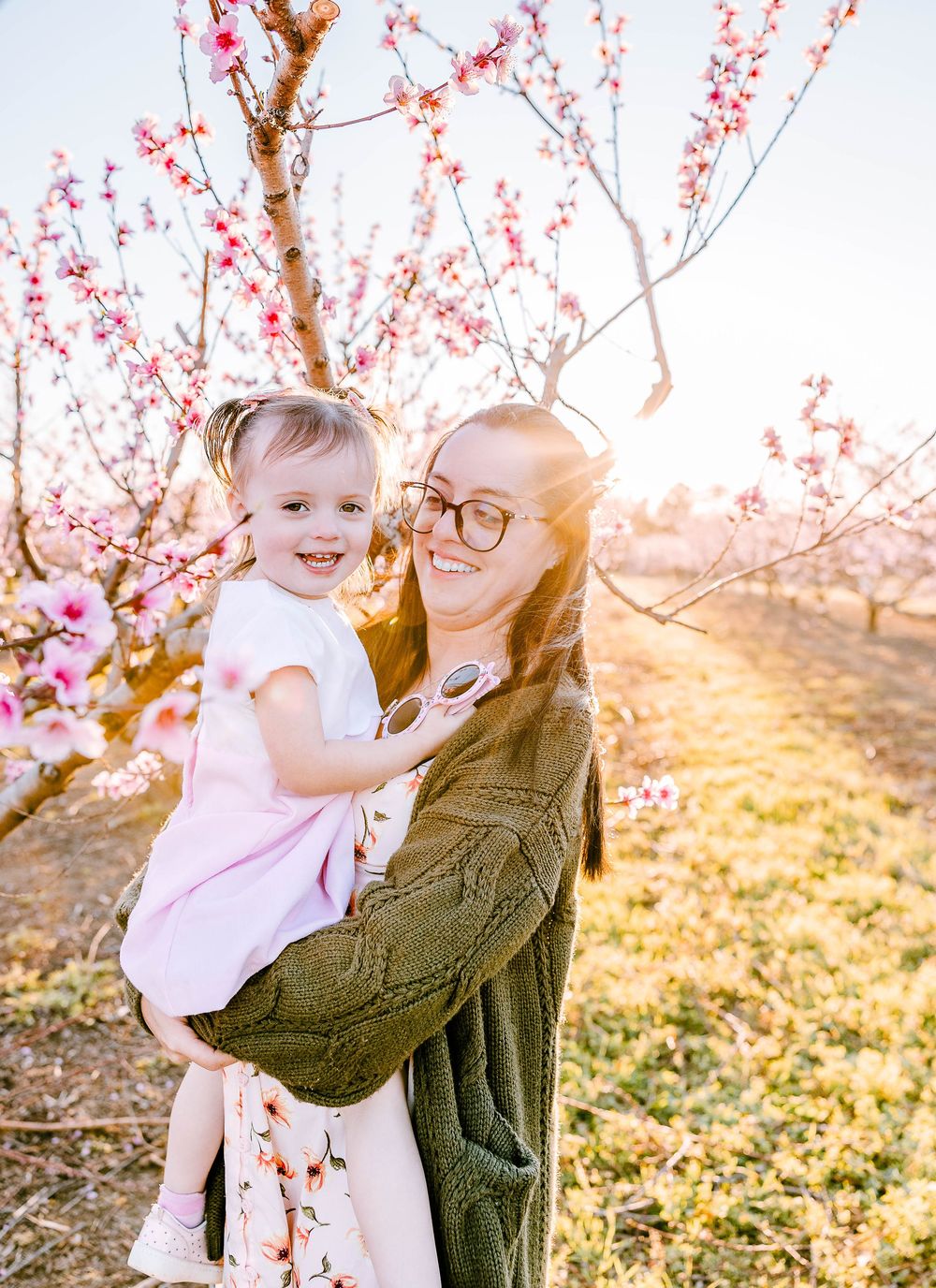 Peach blossoms and pure joy—this Mom and Me session near Clover, SC is one to treasure.