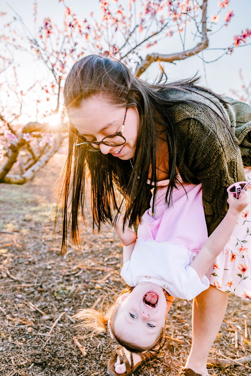 A sweet Mom and Me moment under the peach blossoms near Clover, SC—full of love and spring magic.