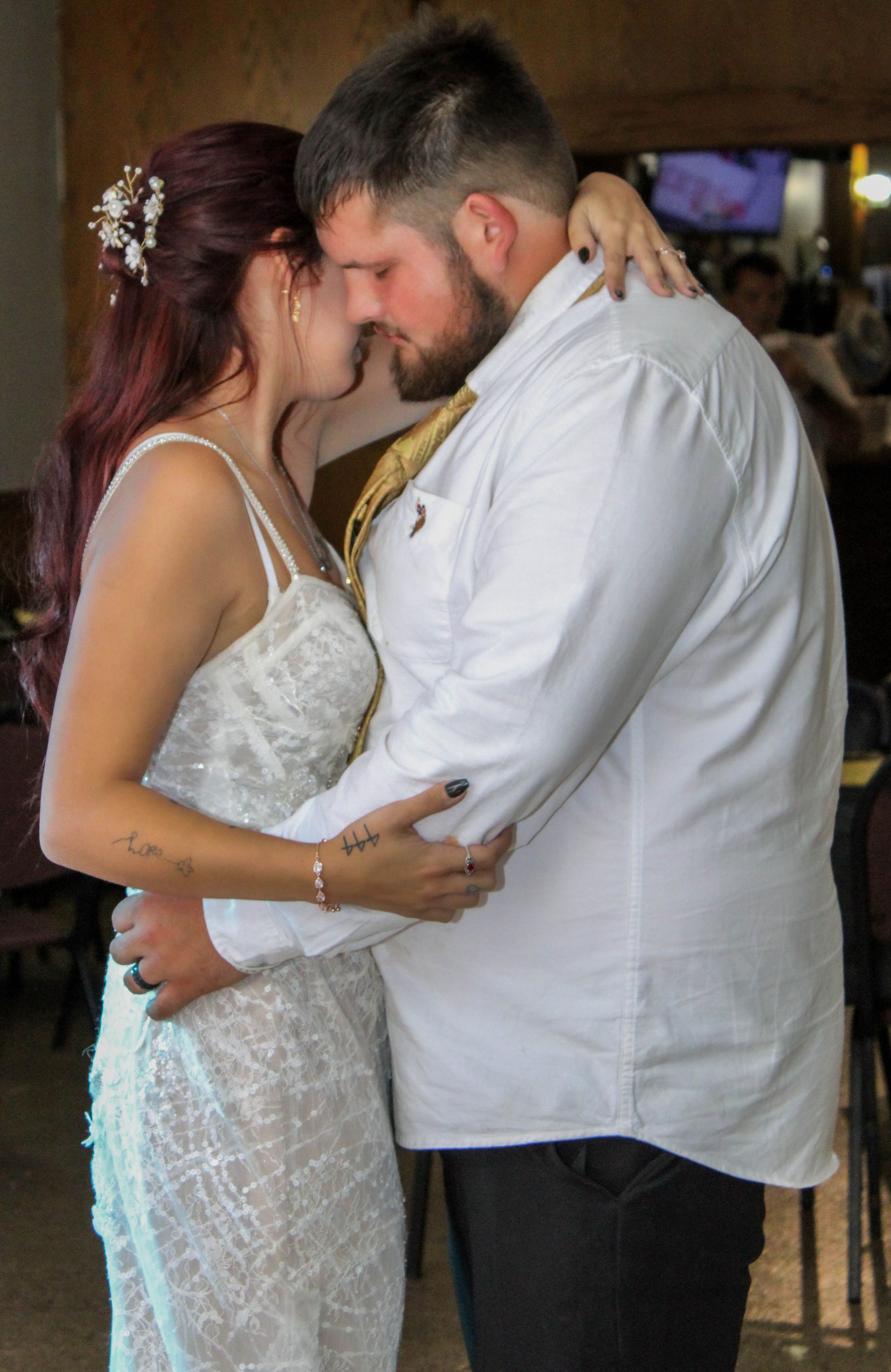 A series of romantic dance poses showing a couple in formal attire at an indoor event.