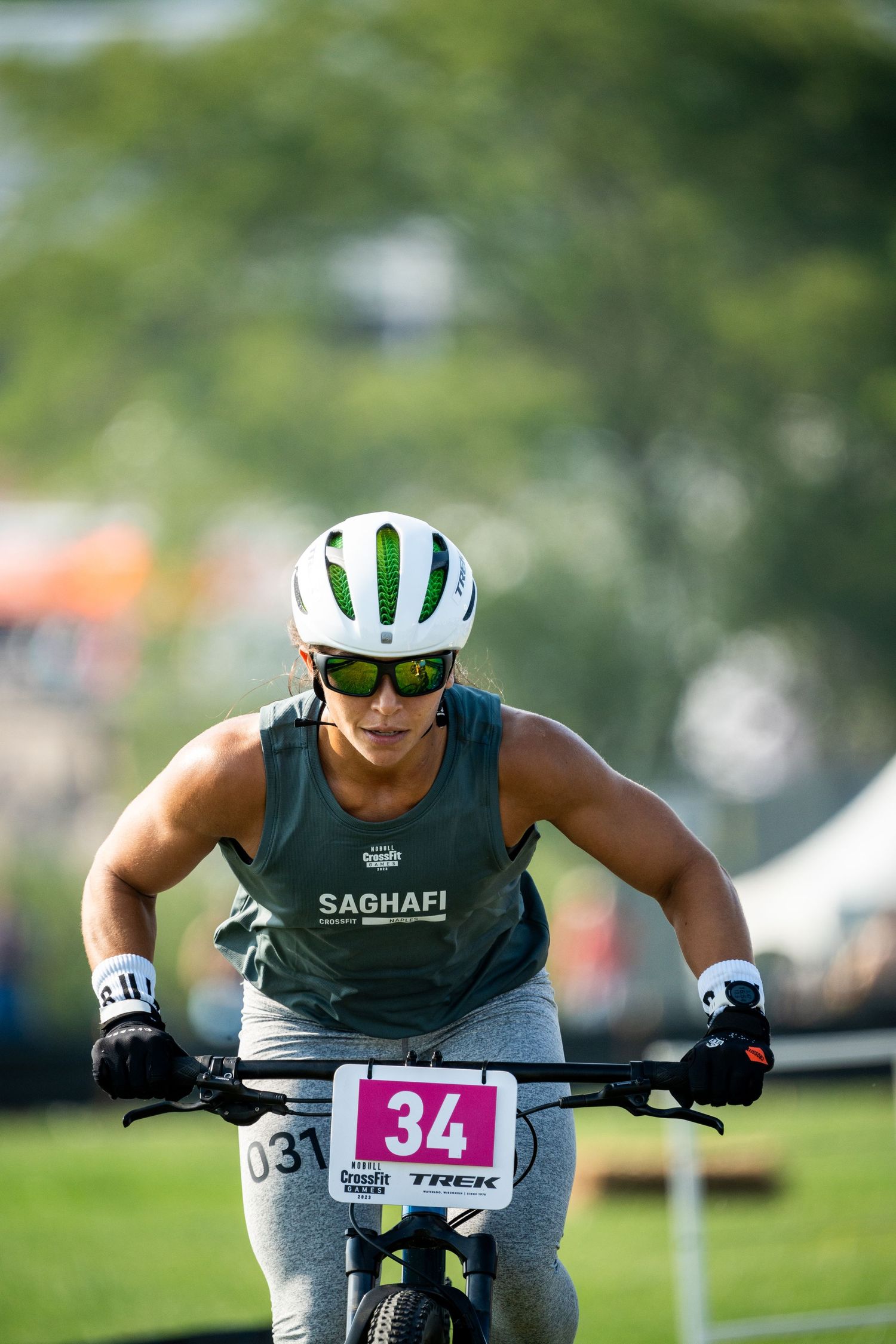 Fee Saghafi at the 2023 CrossFit Games wearing green tank top racing with number 34.