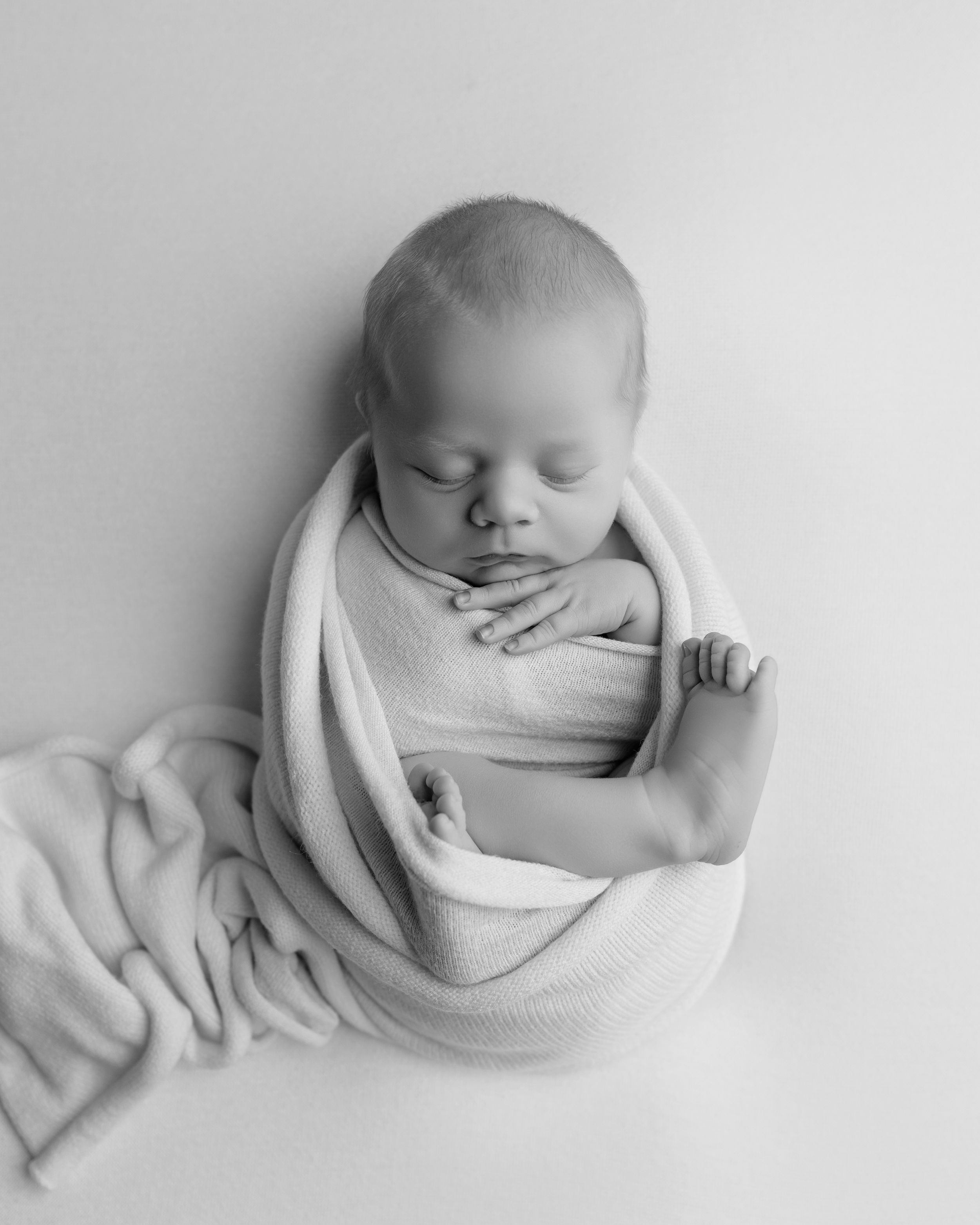 Simple, timeless, tasteful newborn photographs.