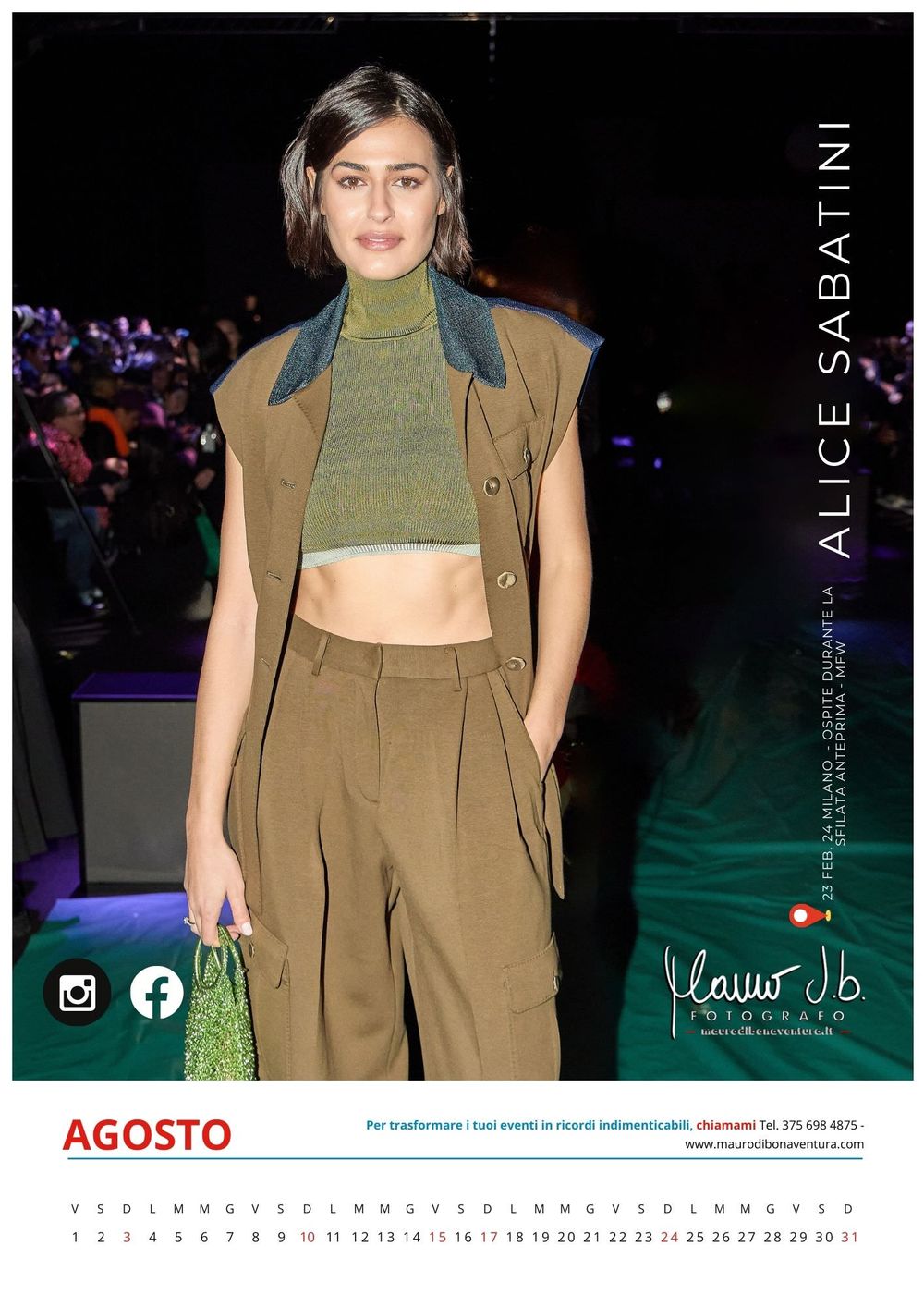 Fashion model wearing olive crop top and tan suit on runway with nighttime lighting and green accent lights.