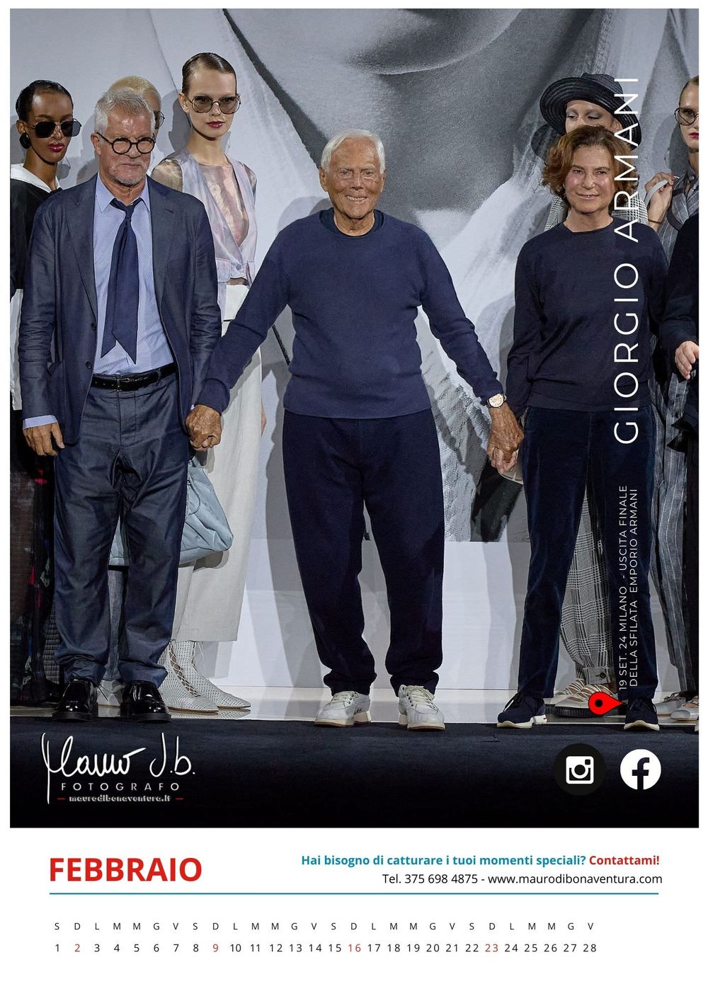 Group of people in formal attire walking together at fashion event with large backdrop.