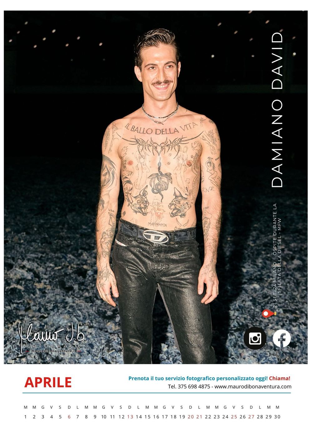 Calendar page showing tattooed model in black leather pants against dark background.