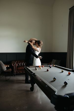 Series of action shots showing a pool player making a dramatic shot on a billiards table in a dimly lit room.