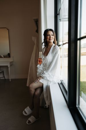 Ethereal bridal portrait series captured by a window in natural light.
