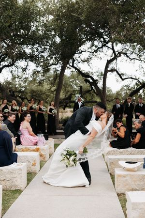 A sequence of wedding photos shows a couple performing a romantic dip pose on a stone patio during their celebration.