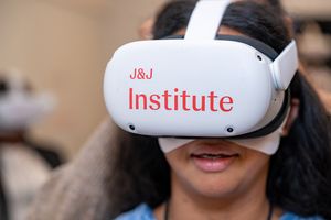 Close-up of J&J Institute virtual reality headset being worn during demonstration.