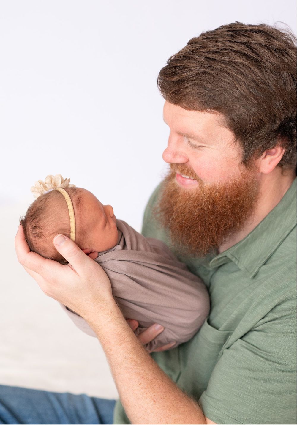 Newborn girl with family in natural light studio by Bartlesville Newborn Photographer Kristi Bray Photography