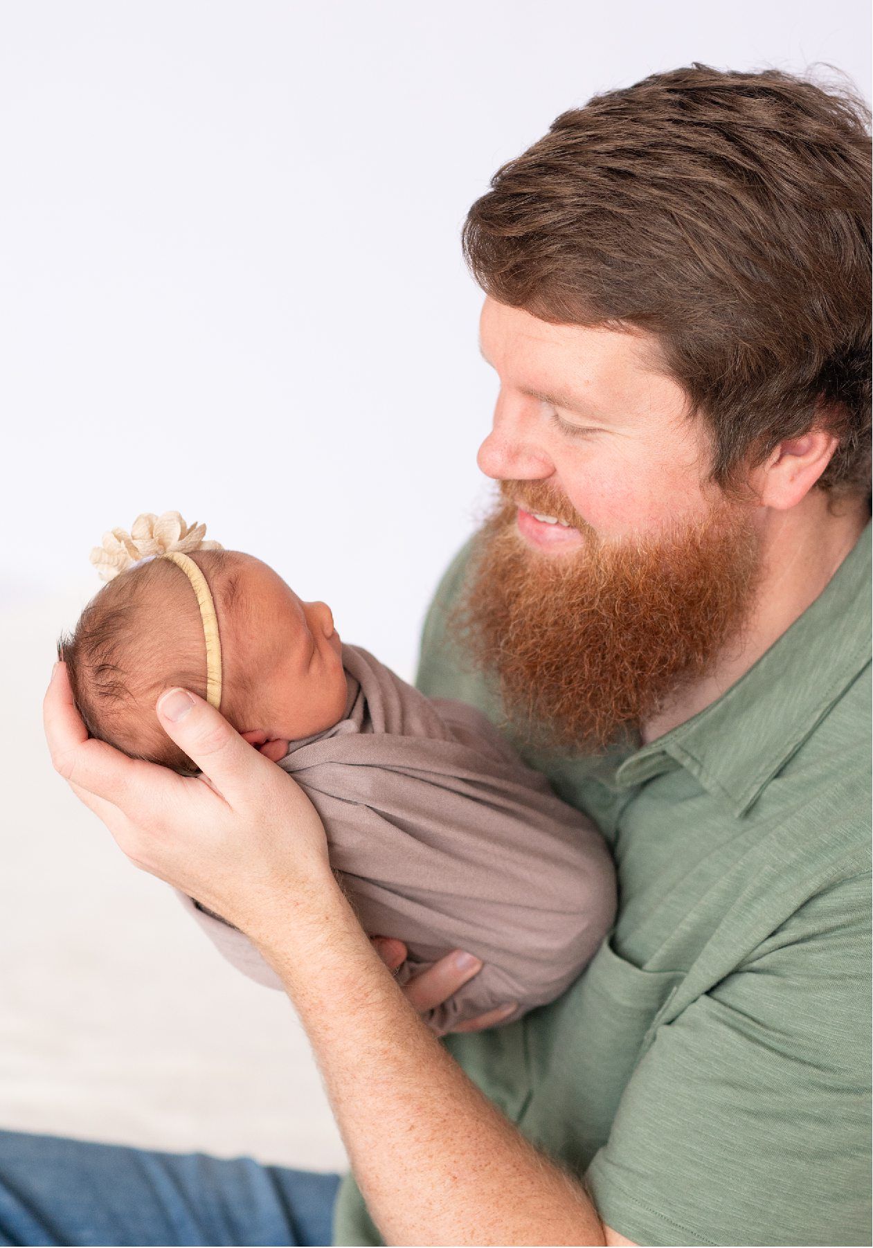 Newborn girl with family in natural light studio by Bartlesville Newborn Photographer Kristi Bray Photography