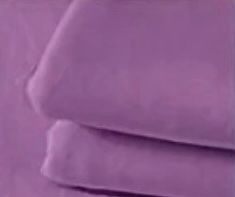 Smooth purple fabric or textile surface shown in detail.
