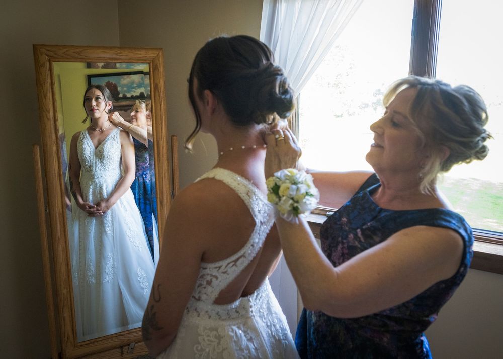Series of getting ready moments showing white wedding dress preparations in a sunlit room.