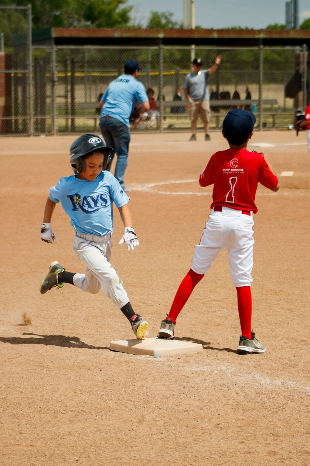 Young boys playing Little League Baseball during a sports photography session in Amarillo, Texas
