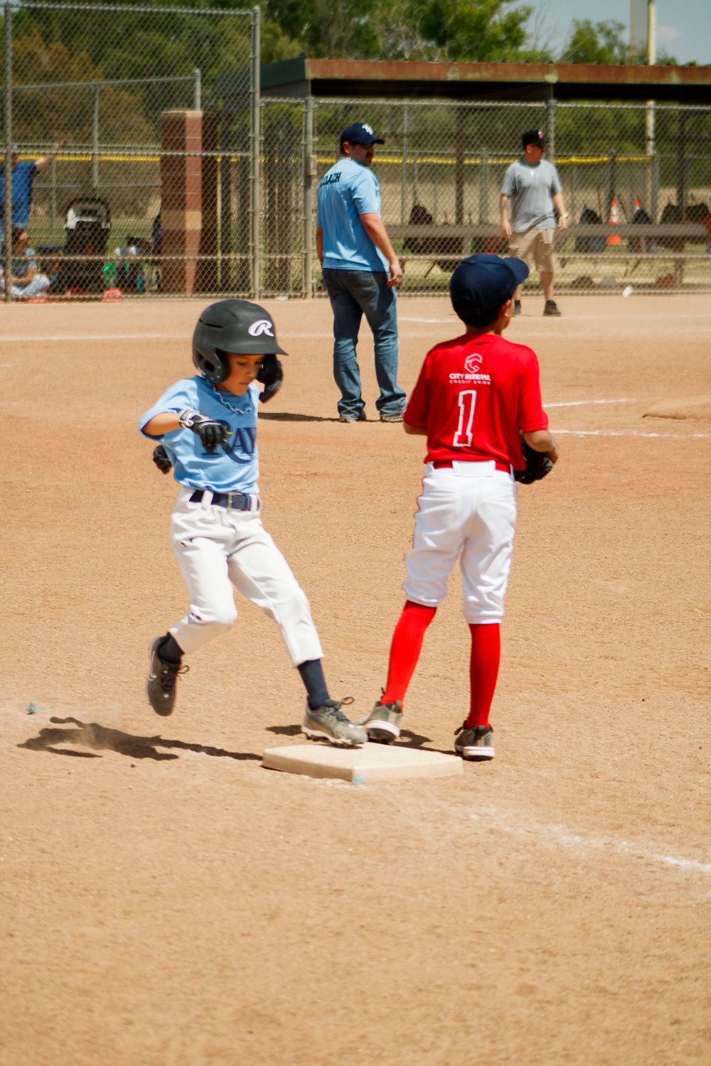 Young boys playing Little League Baseball during a sports photography session in Amarillo, Texas