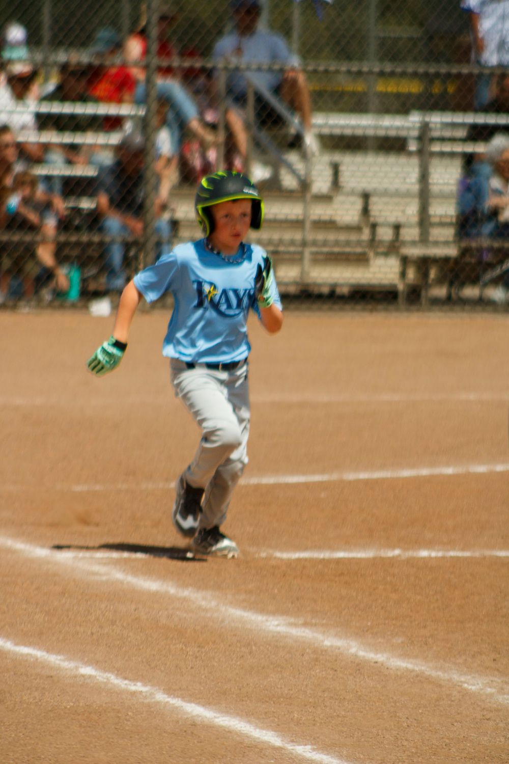 Young boys playing Little League Baseball during a sports photography session in Amarillo, Texas