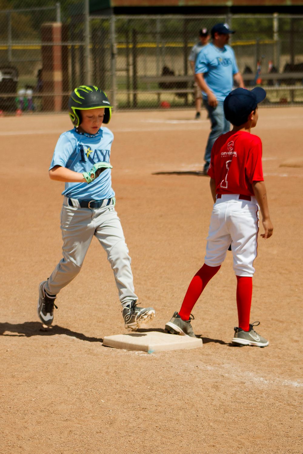 Young boys playing Little League Baseball during a sports photography session in Amarillo, Texas