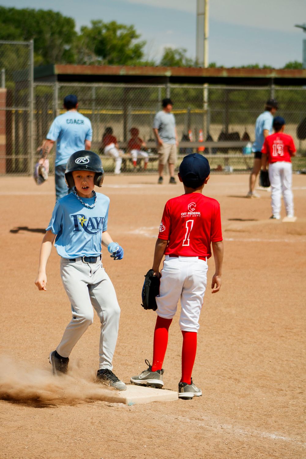 Young boys playing Little League Baseball during a sports photography session in Amarillo, Texas